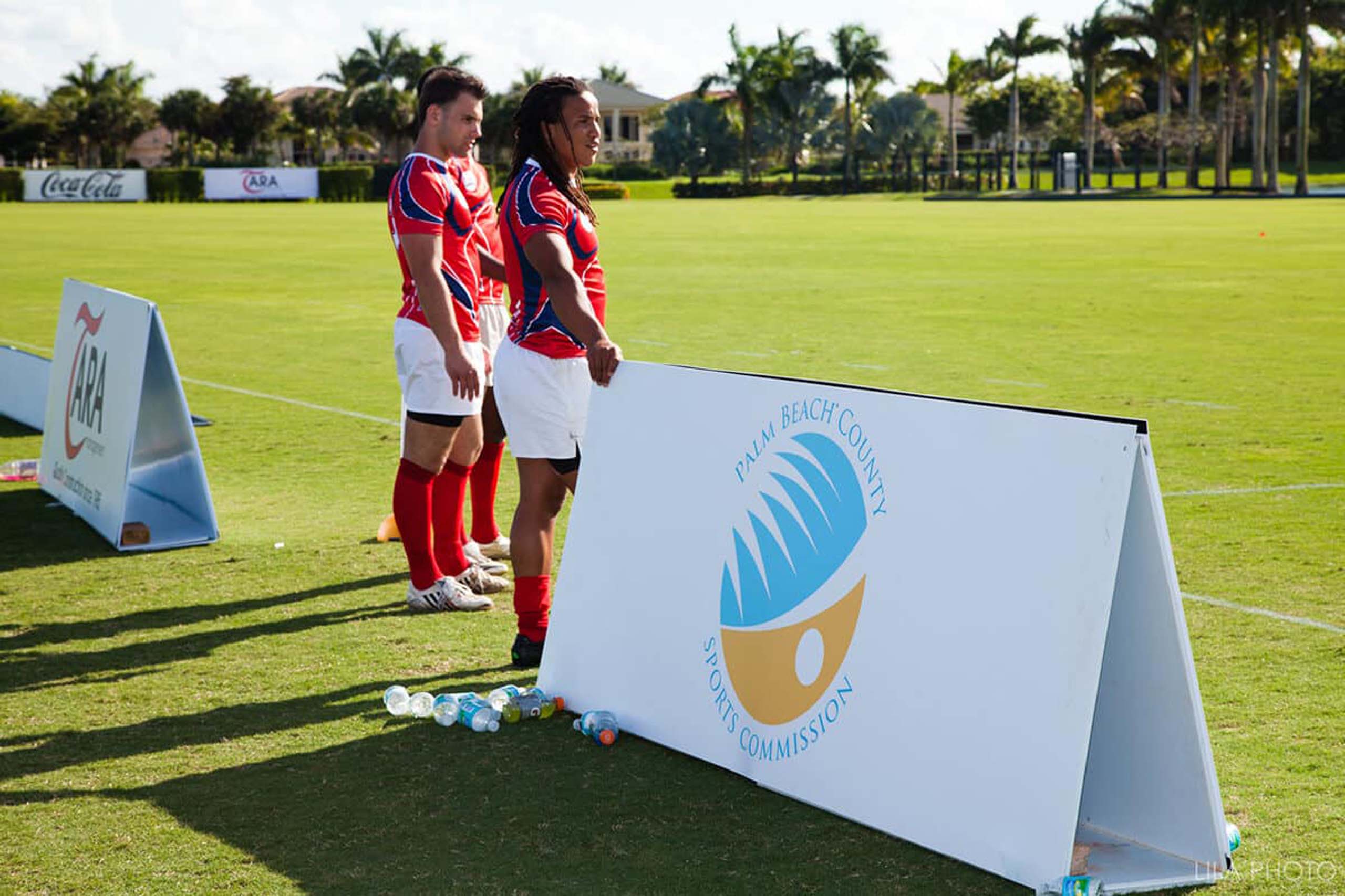 Two girls playing soccer